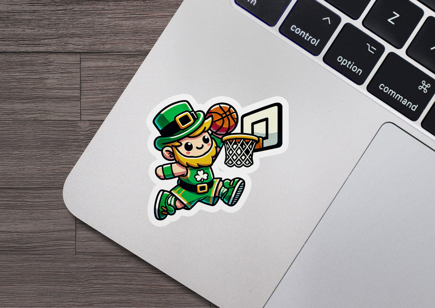 a laptop with a sticker of a basketball player