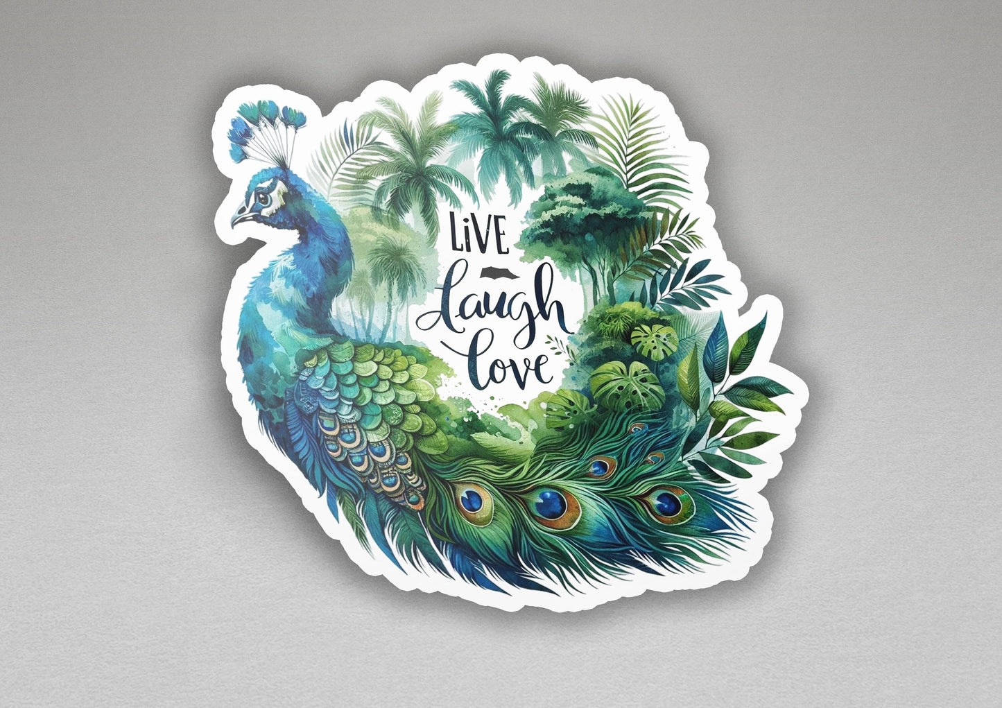 a sticker of a peacock with the words live laugh love