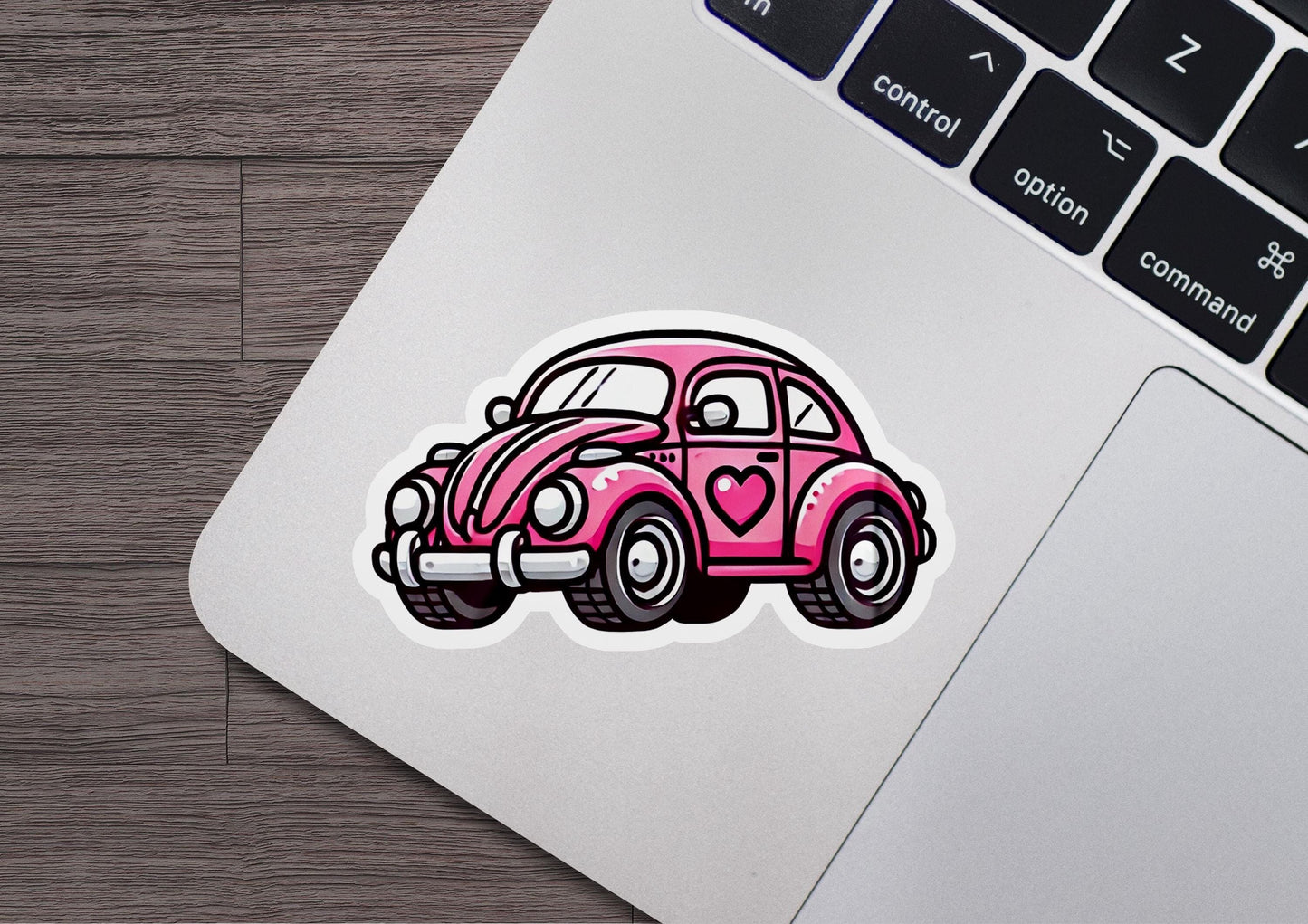 a sticker of a pink car with a heart on it