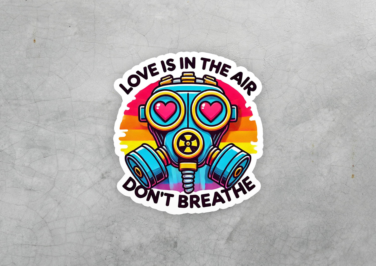 a sticker that says love is in the air don't breathe