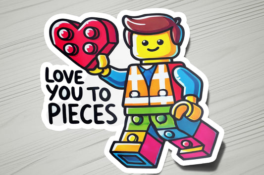 a sticker of a lego man holding a heart