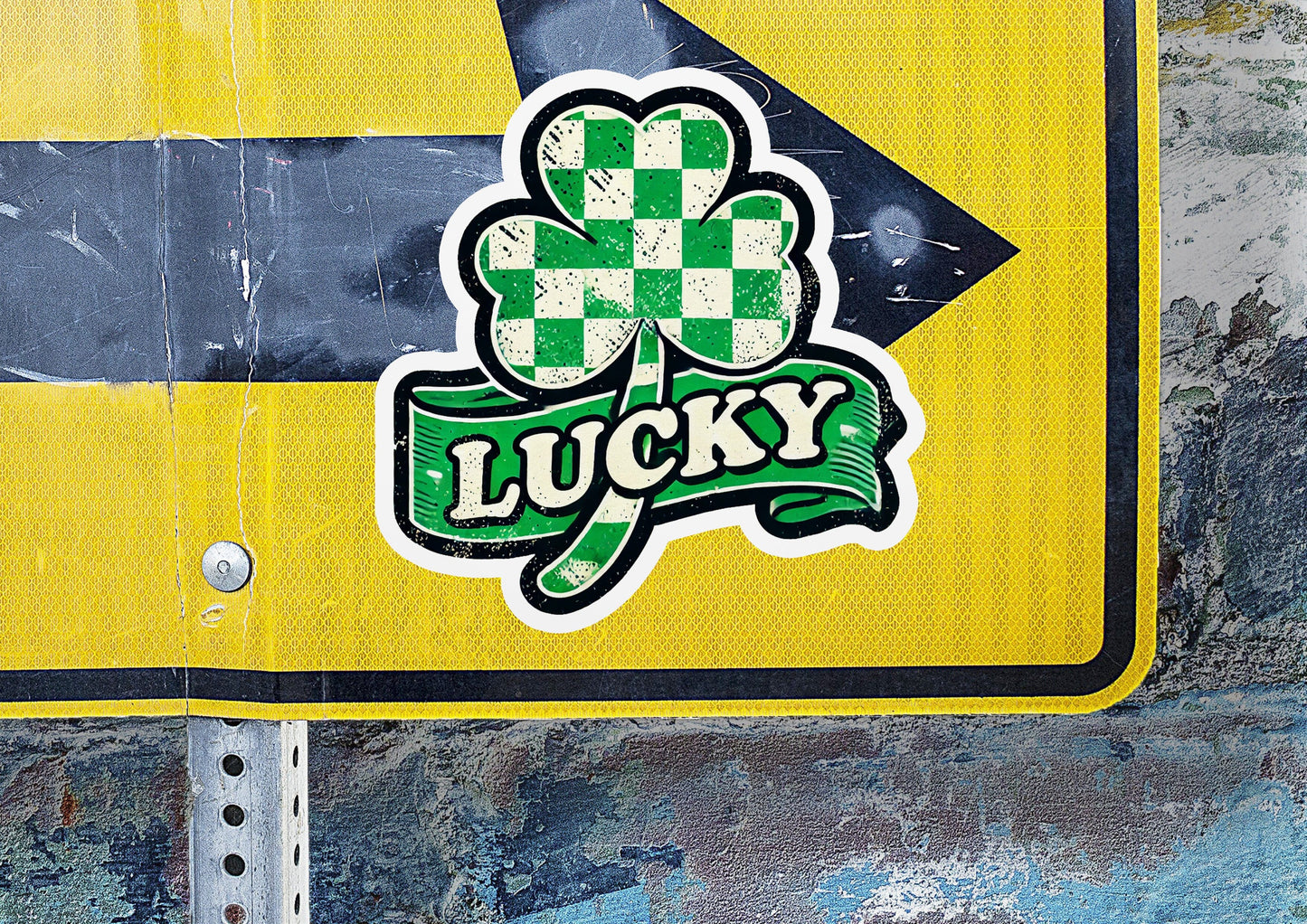 a close up of a street sign with a clover