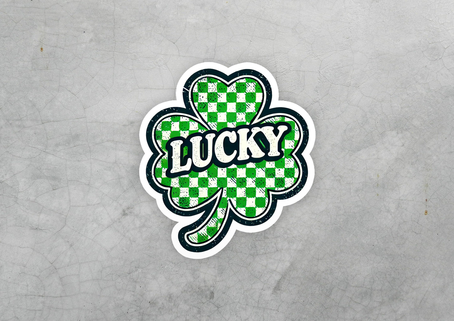 a sticker that says lucky with a four leaf clover