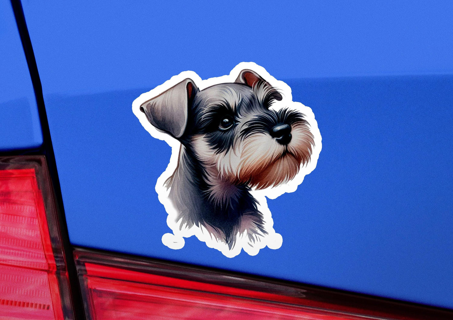 a dog sticker on the back of a car