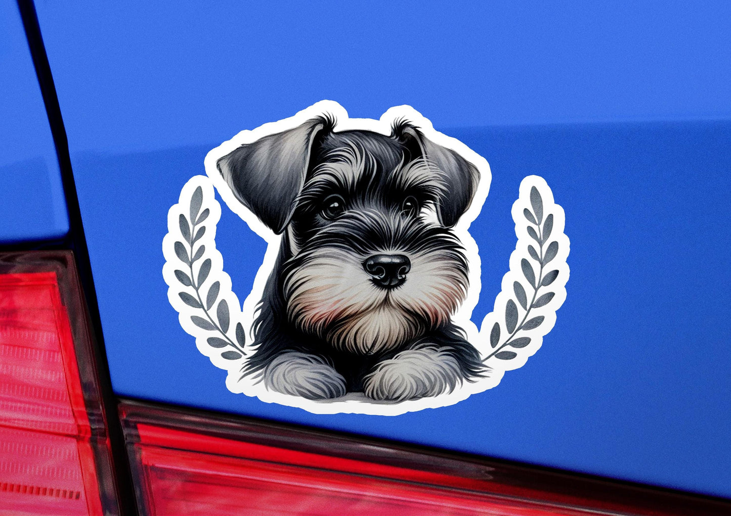 a sticker of a dog on the back of a car