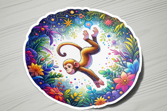 a sticker of a monkey hanging from a tree