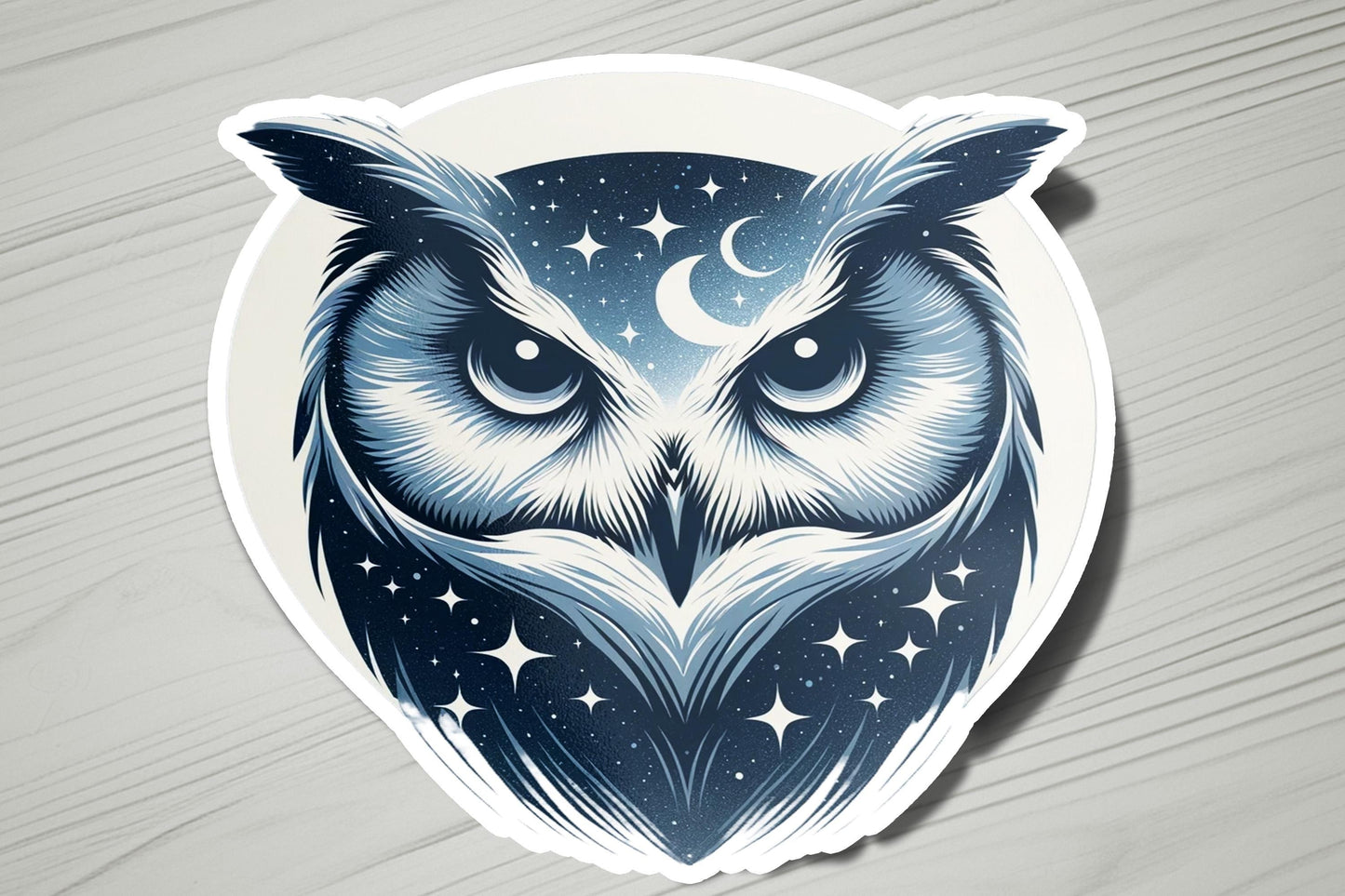 a sticker of an owl with stars and the moon