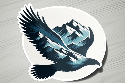 a sticker of an eagle flying with mountains in the background