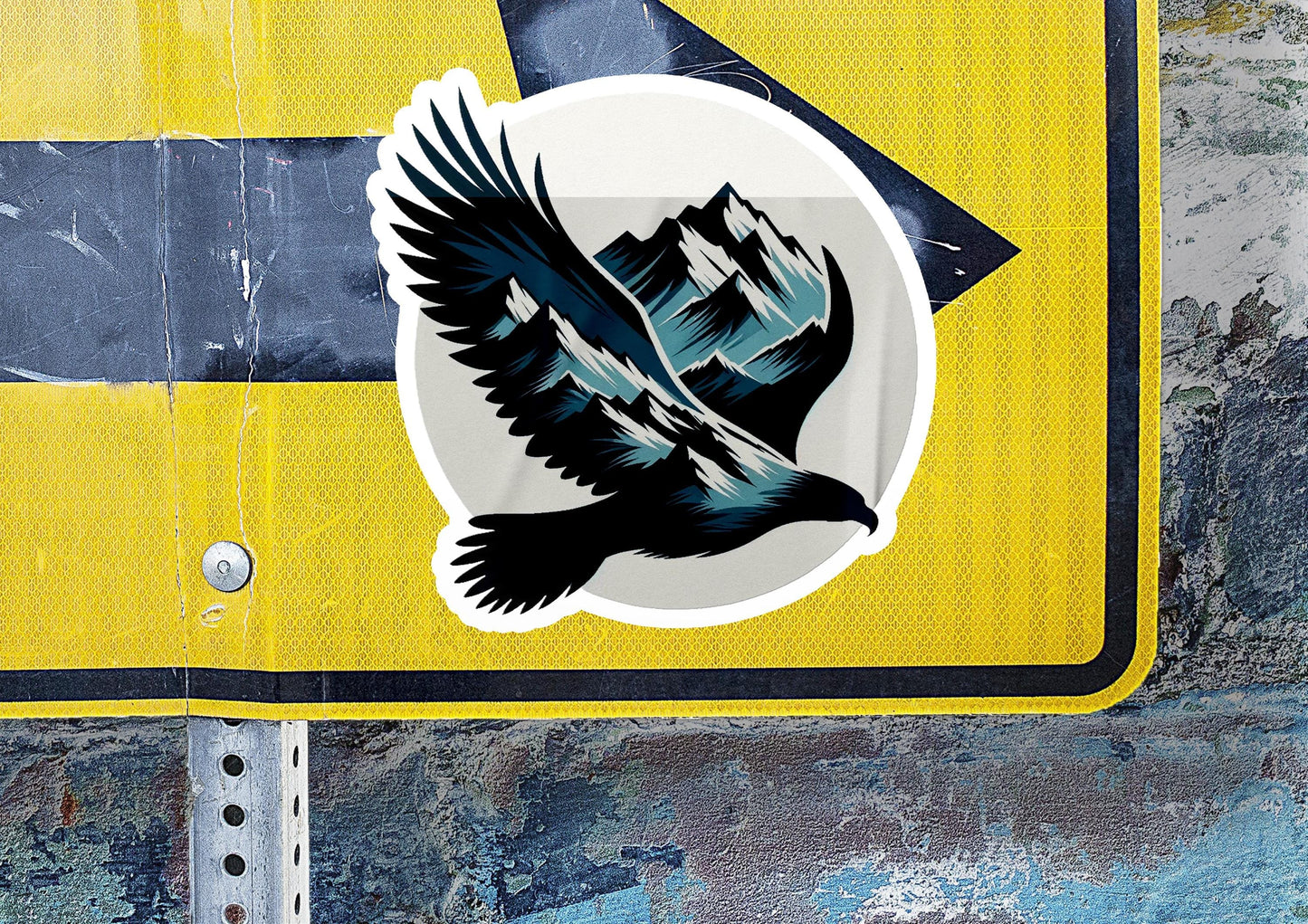 a sticker of a bird flying over a mountain