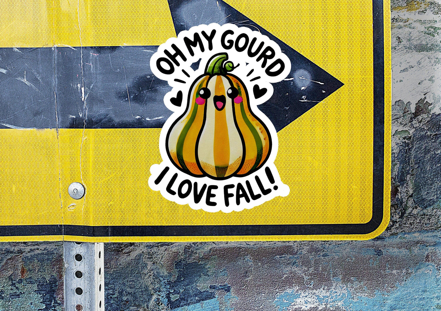 a yellow street sign with a sticker on it