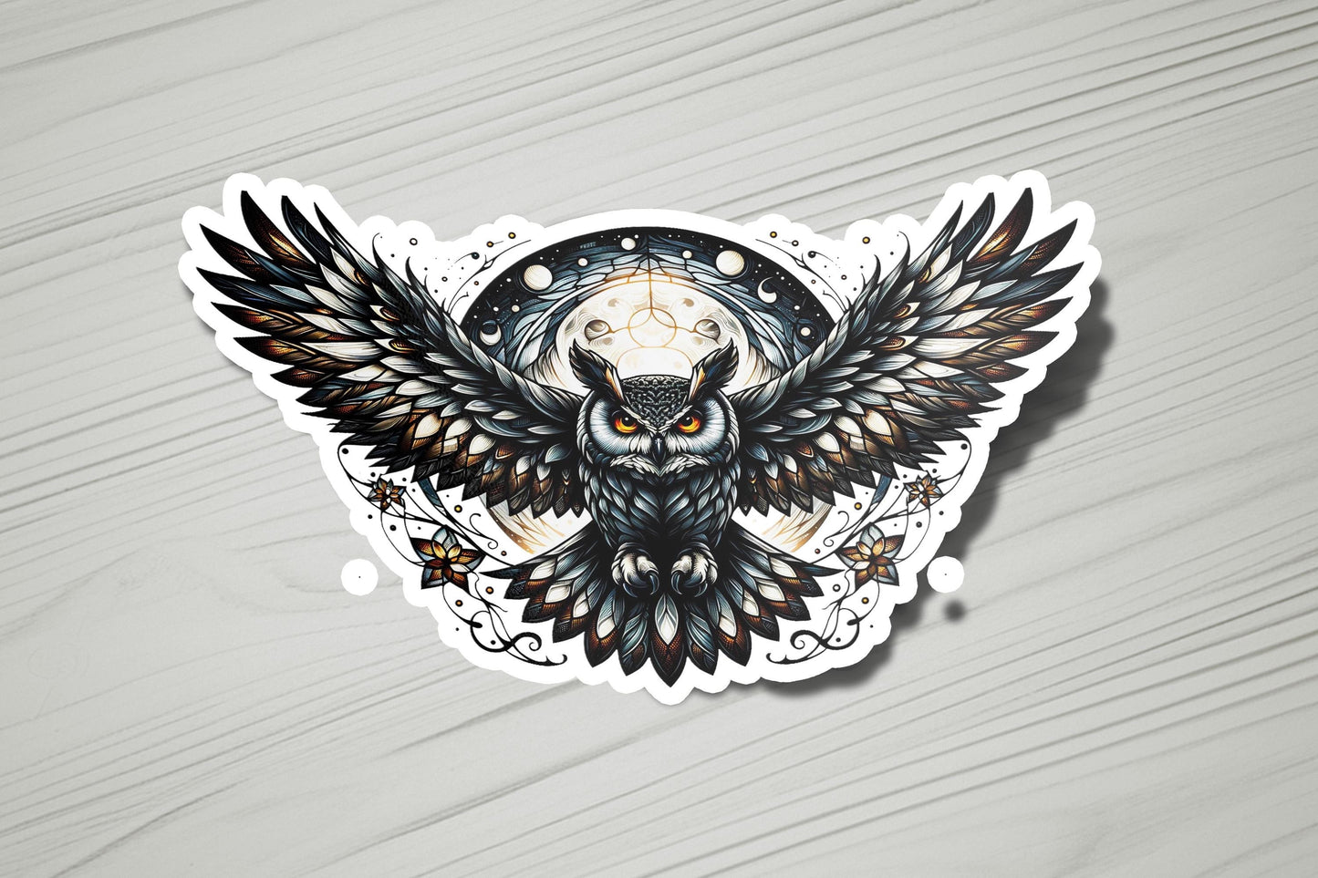 a sticker of an owl with a skull on it