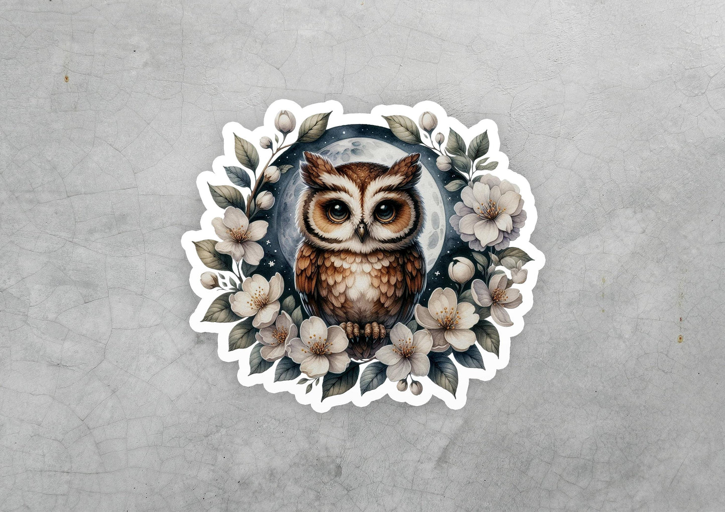 a sticker of an owl surrounded by flowers