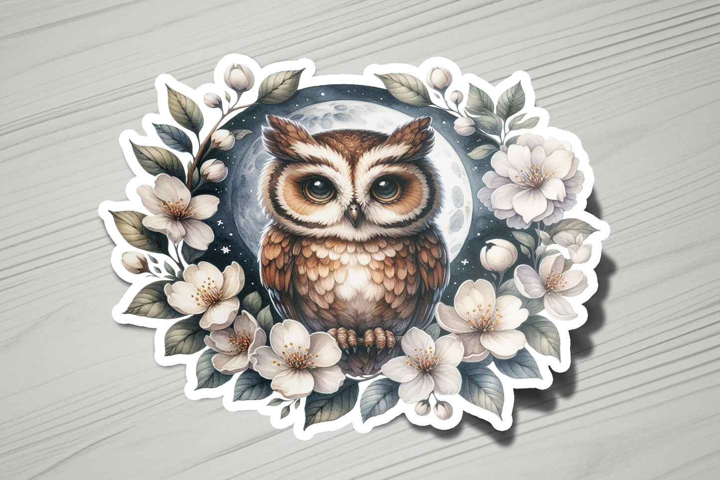a sticker with an owl and flowers on it