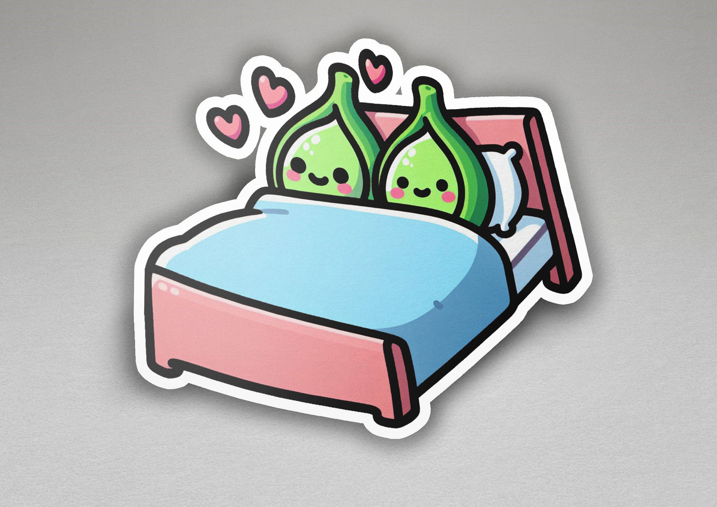 a sticker of a bed with two pillows