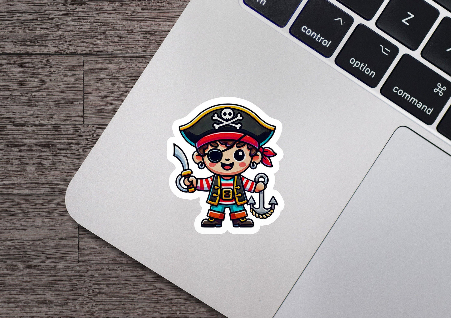 a laptop with a sticker of a pirate holding a sword