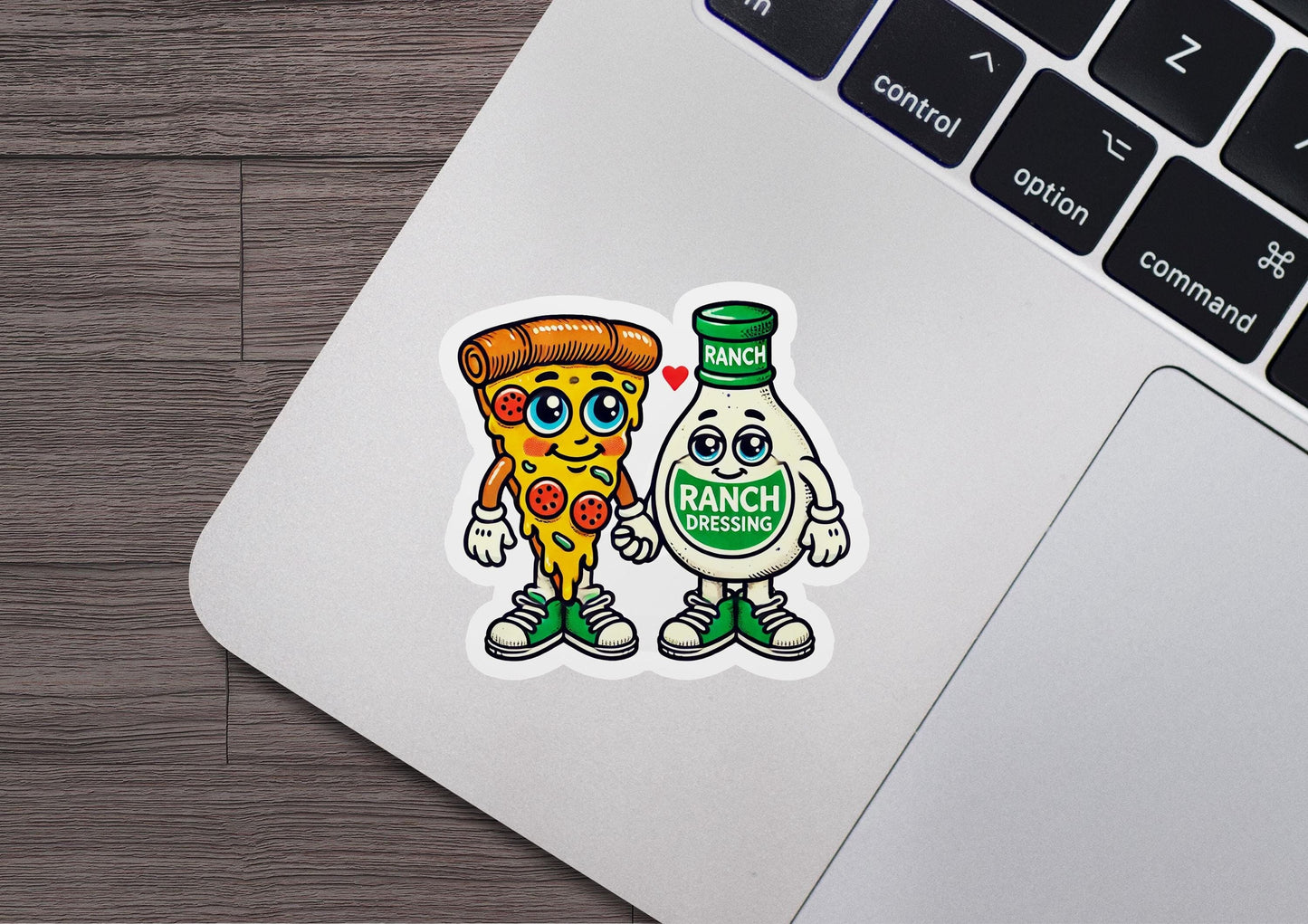 a laptop with a sticker of a couple of pizzas on it