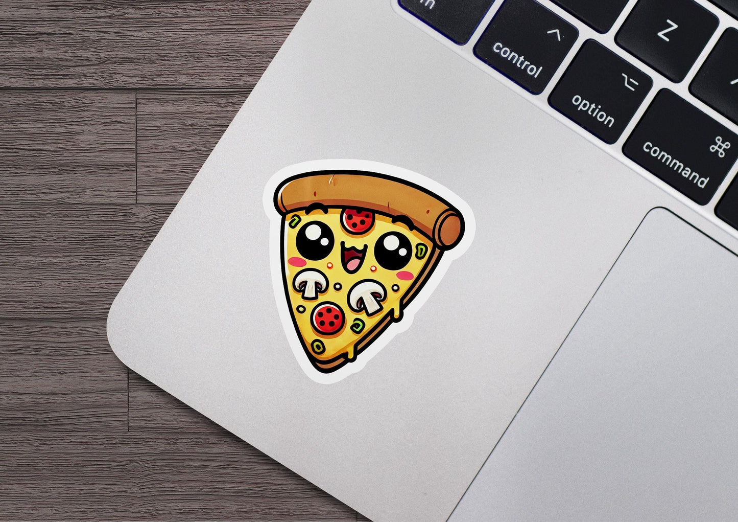 a laptop with a sticker of a slice of pizza on it