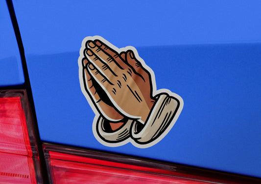a car with a sticker of a praying hand