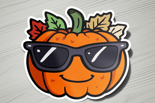 a sticker of a pumpkin wearing sunglasses