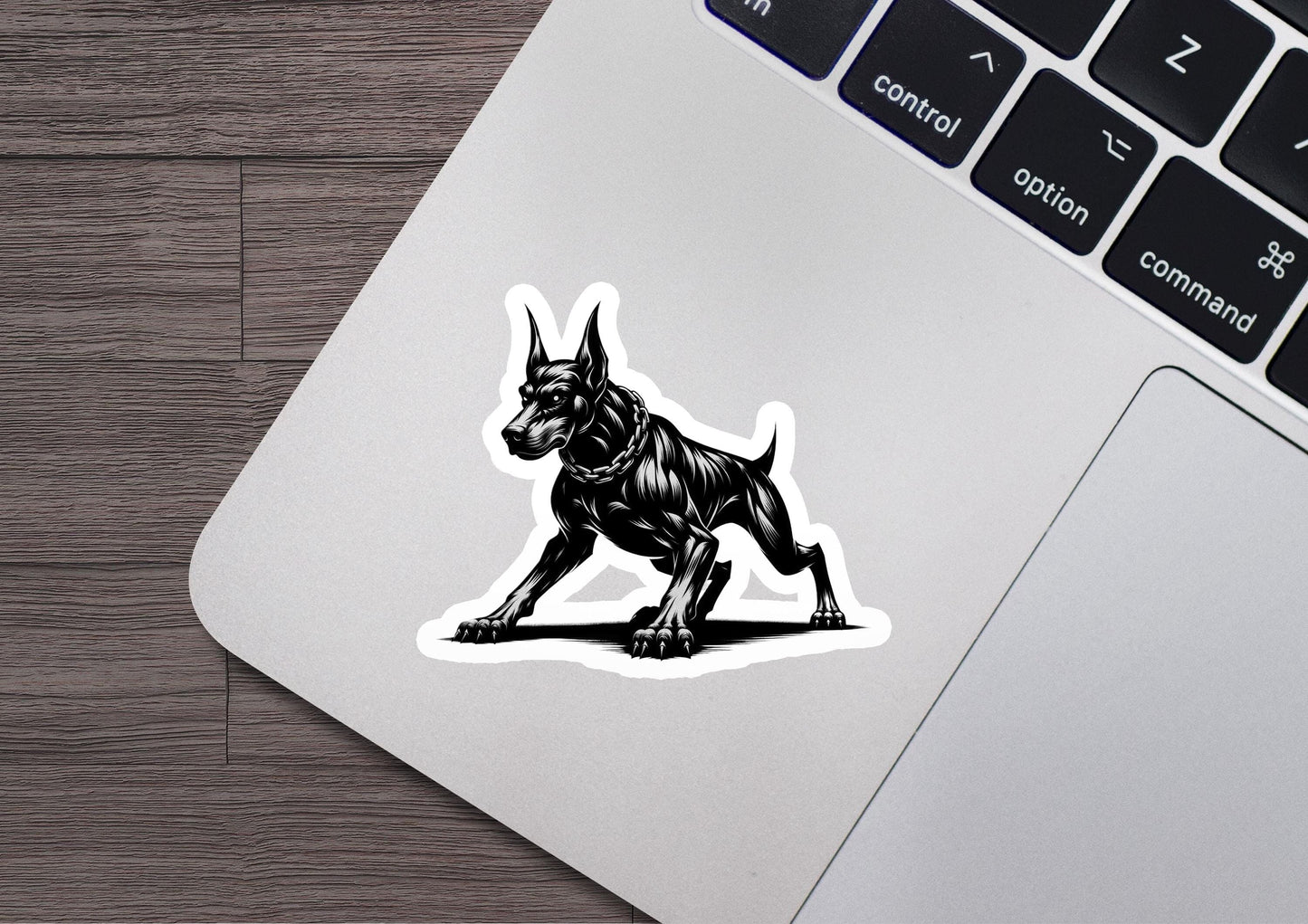 a sticker of a dog on a laptop
