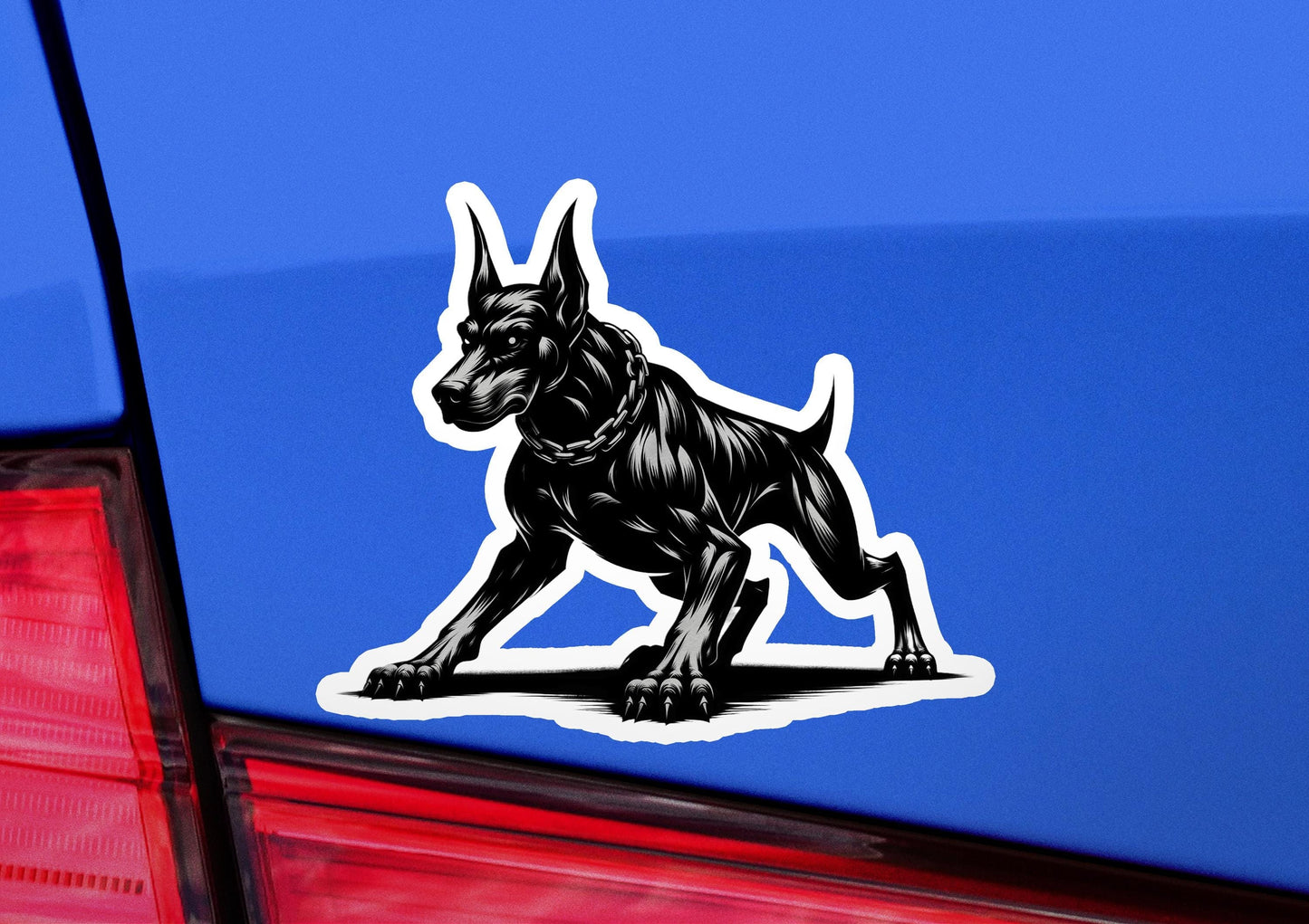 a sticker of a dog on the back of a car