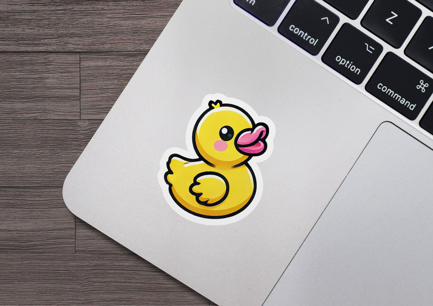 a sticker of a yellow rubber ducky