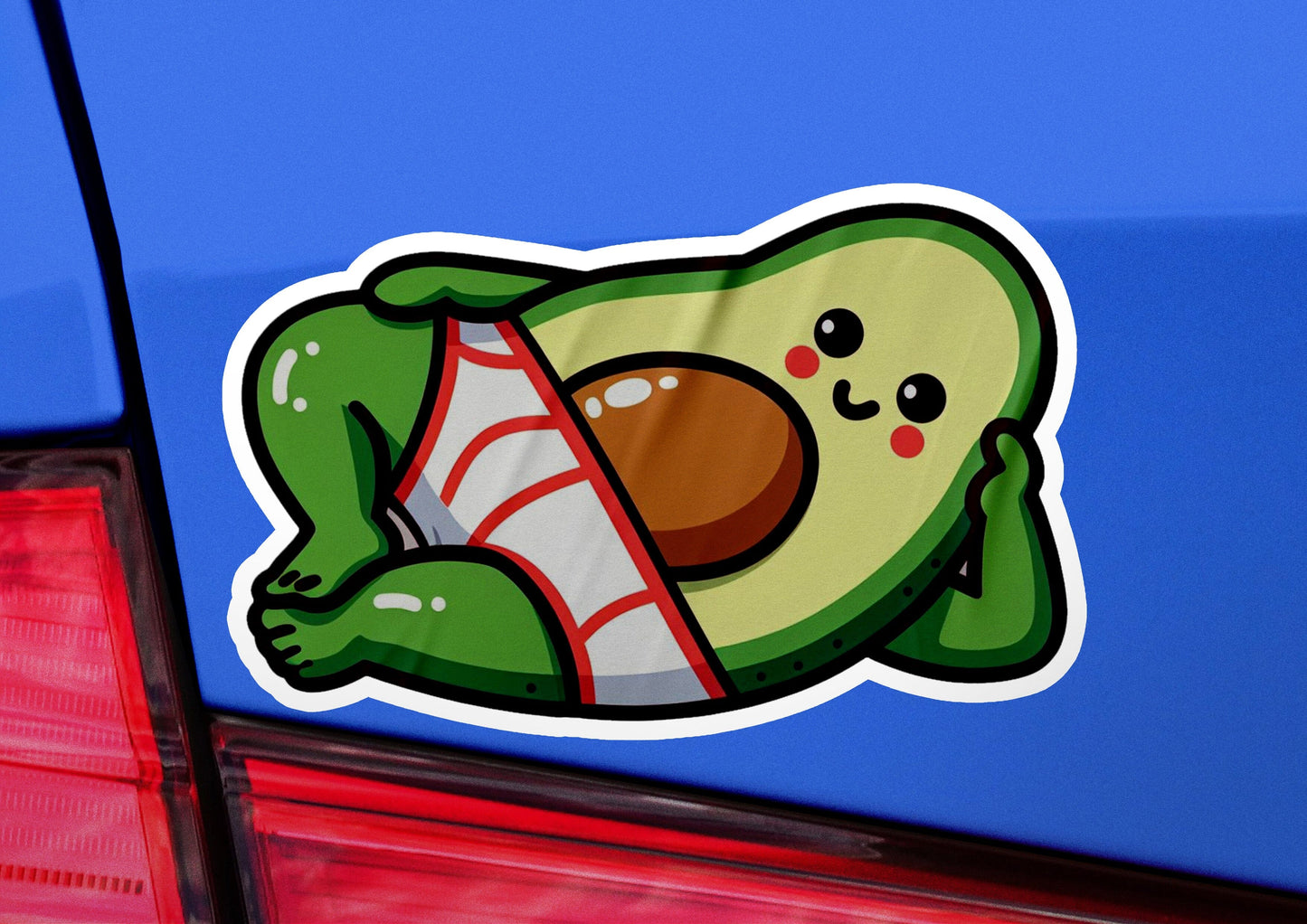 an avocado sticker on the back of a car