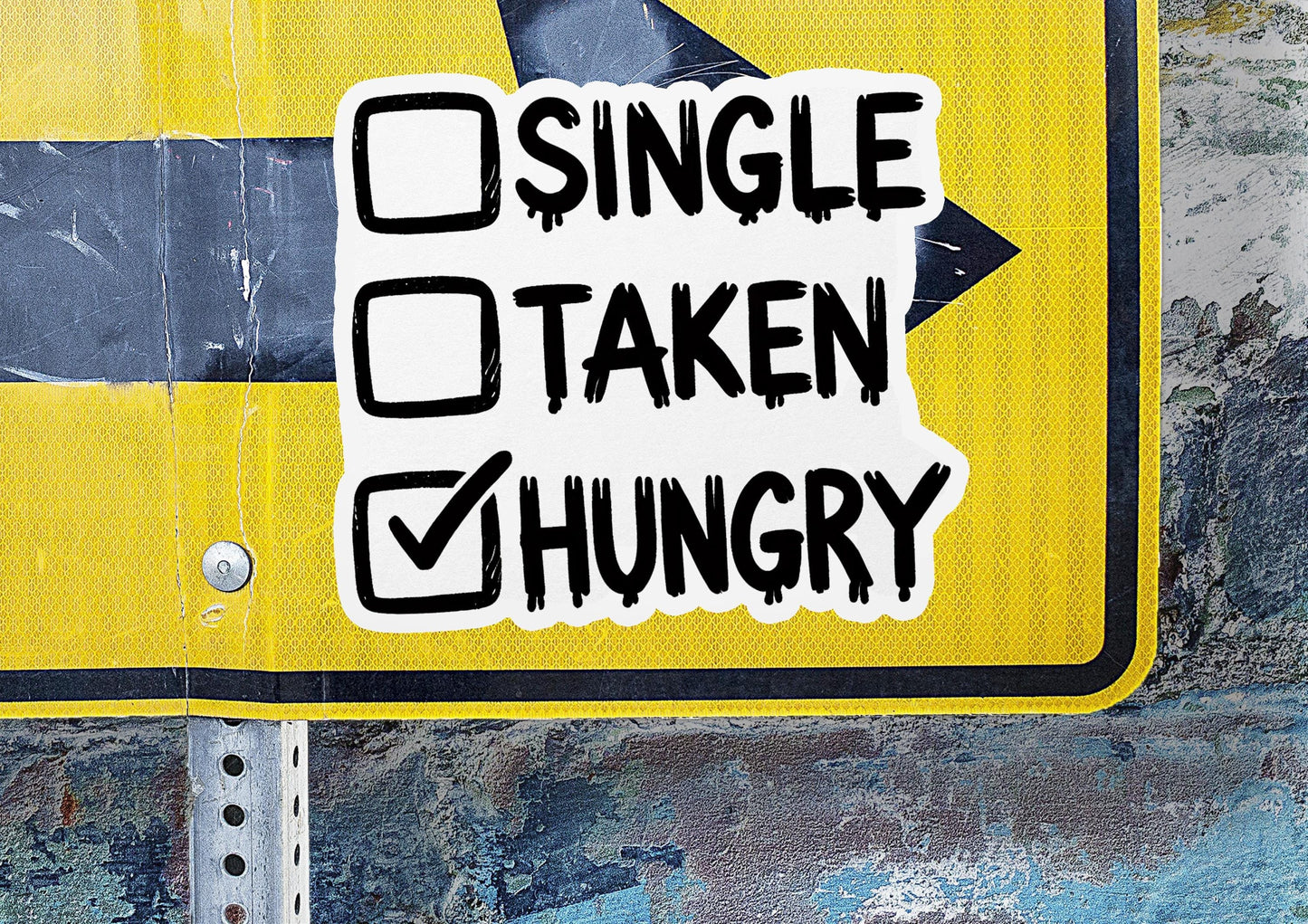 a yellow sign with black writing on it