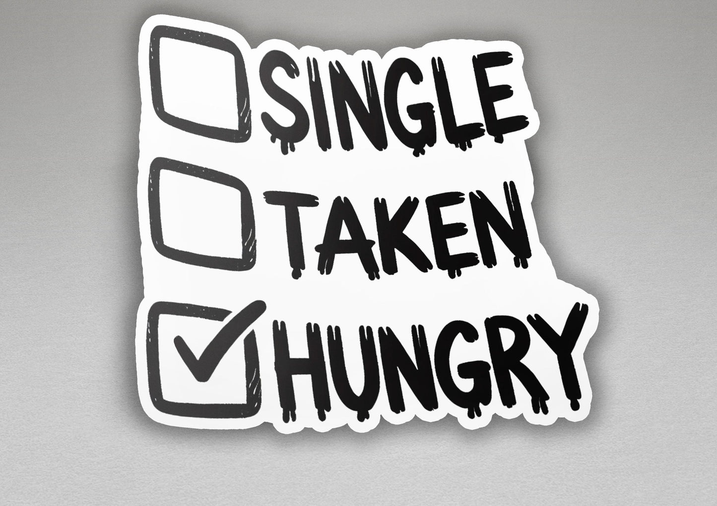 a sticker that says single taken hungry