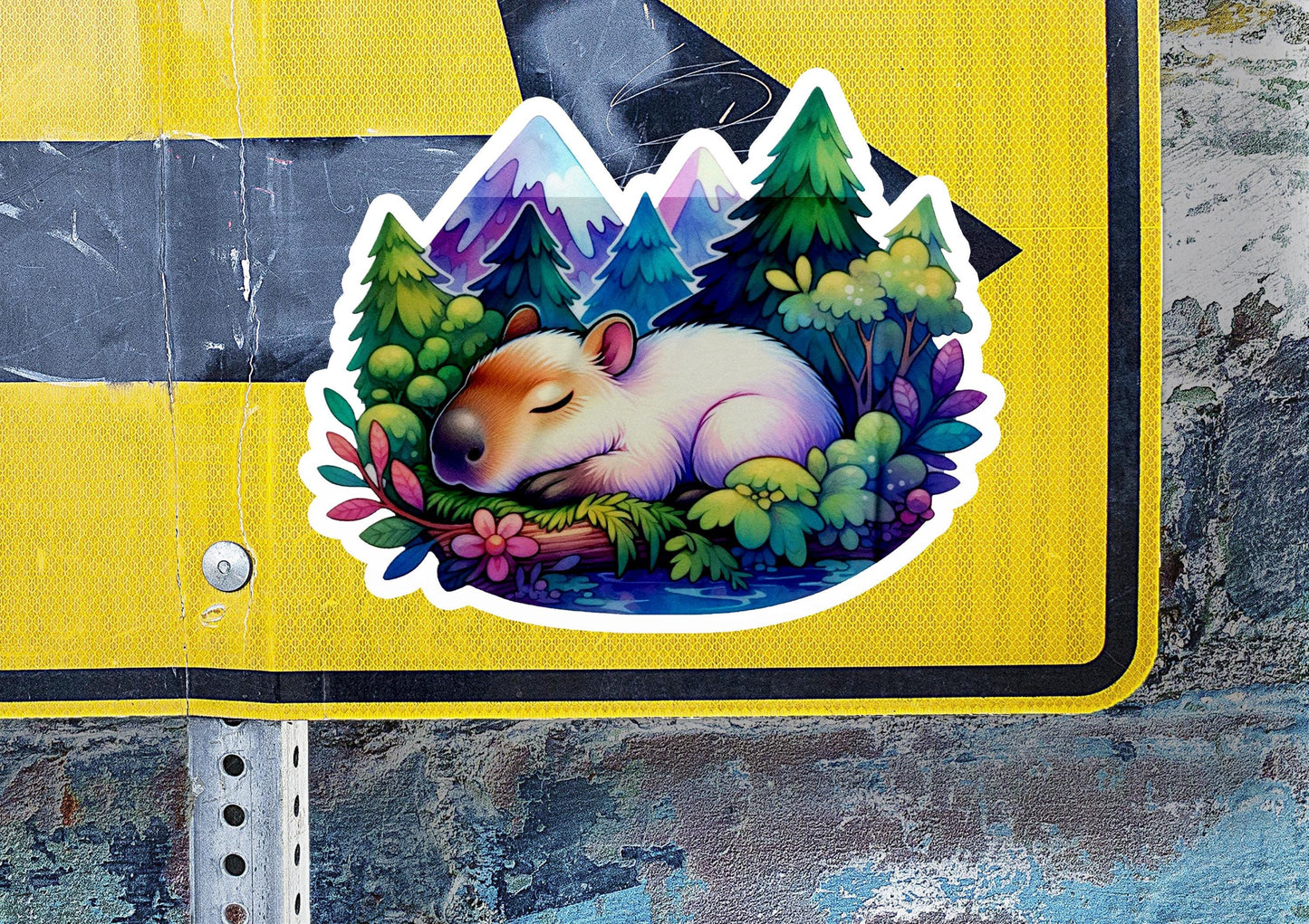 a sticker of a sleeping hamster on a road sign