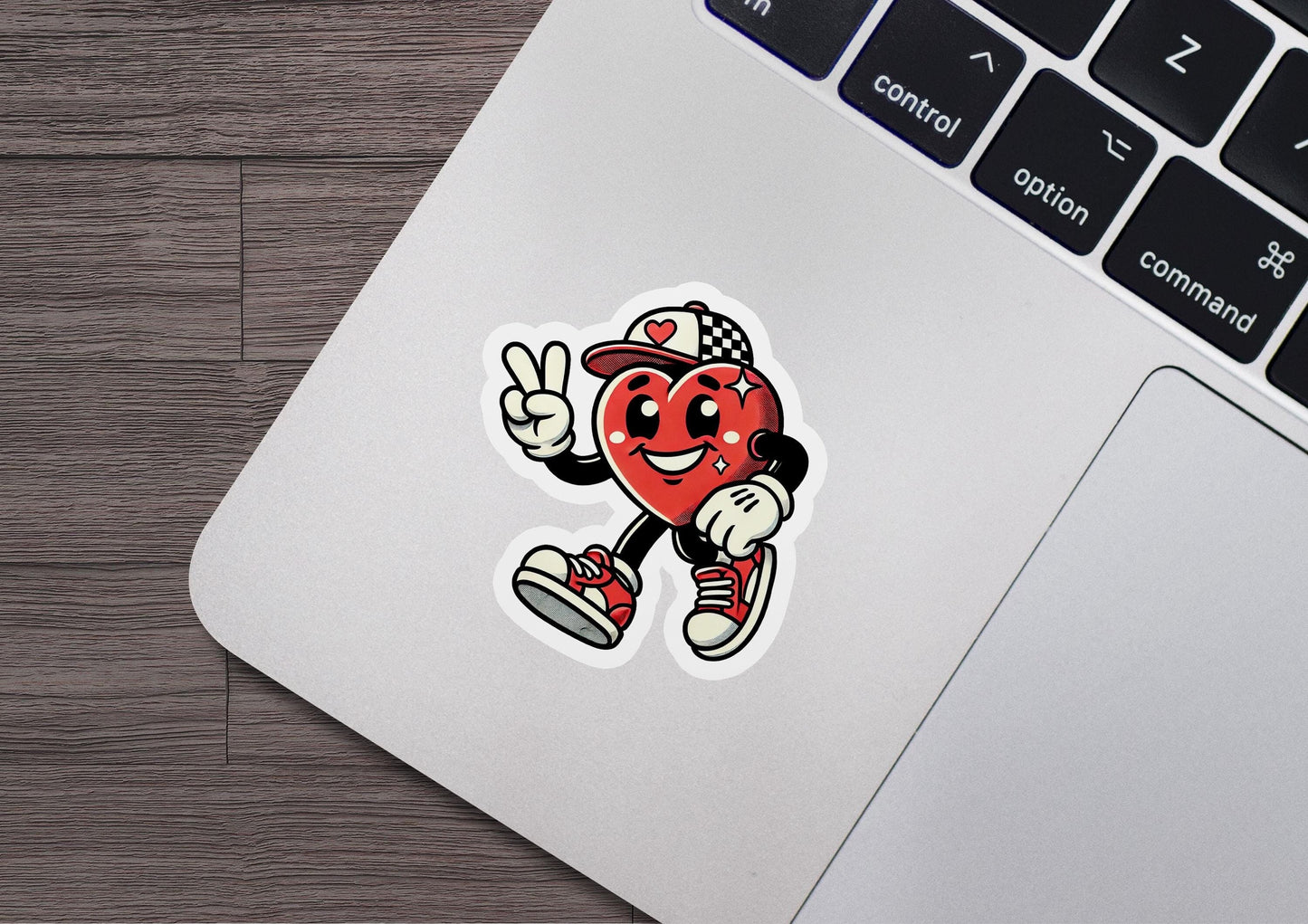 a sticker of a heart running on a laptop