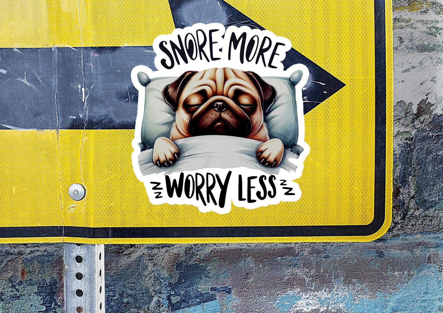 a sticker of a pug peeking out of a pillow