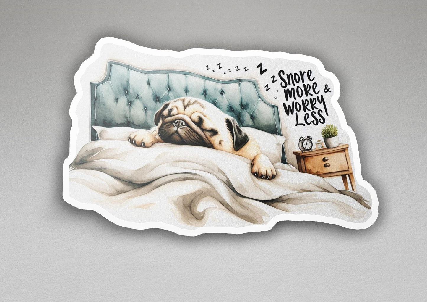a sticker of a dog sleeping on a bed