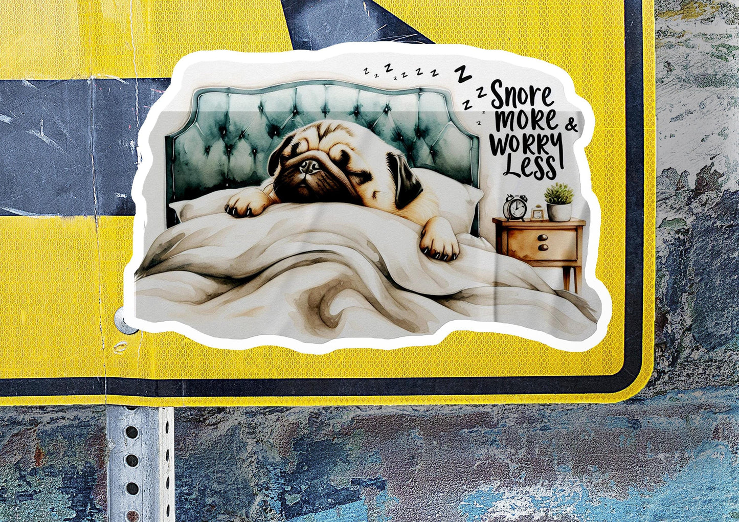 a sticker of a dog sleeping on a bed