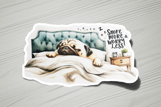 a sticker of a dog sleeping on a bed