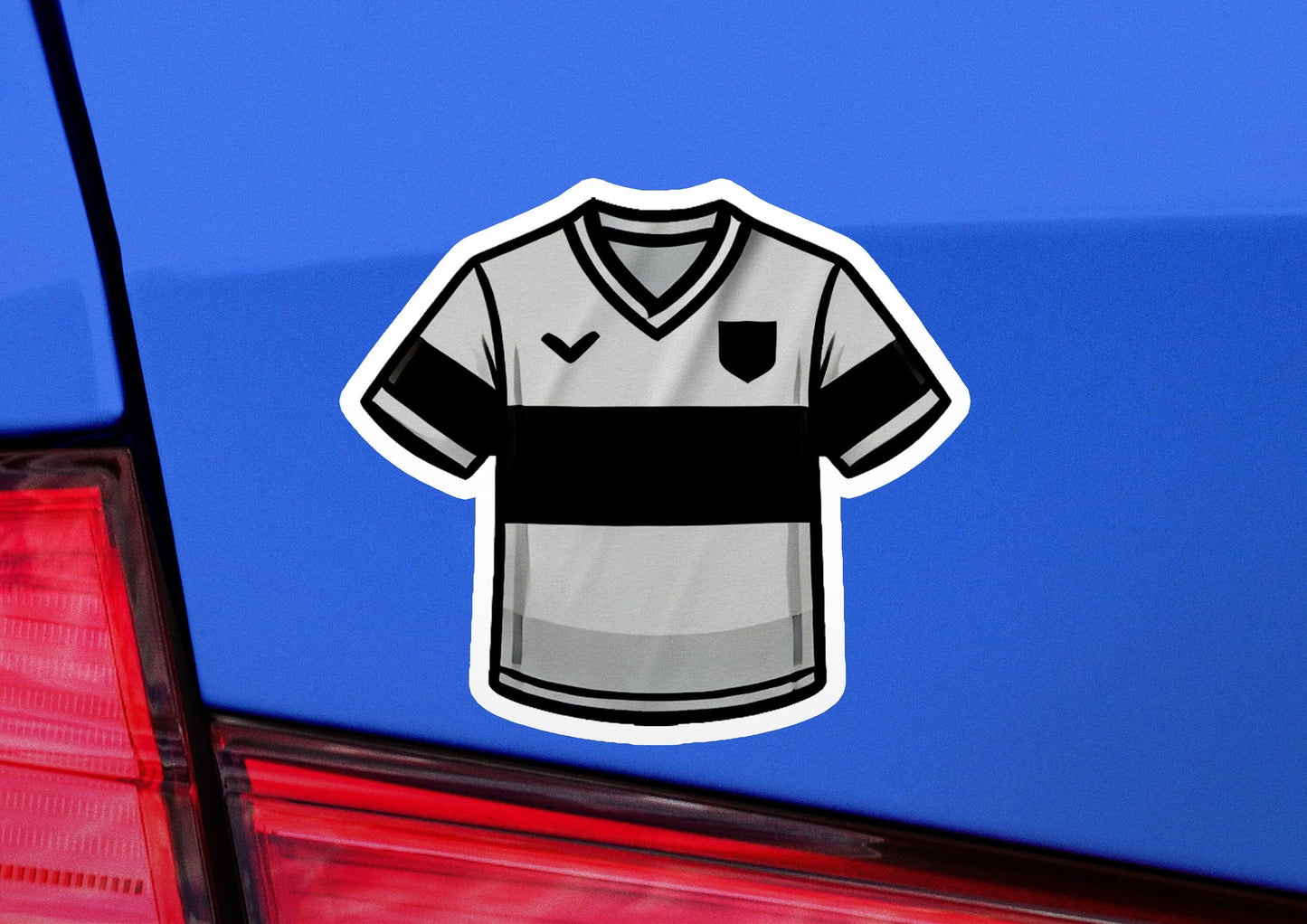 a sticker of a soccer jersey on the back of a car