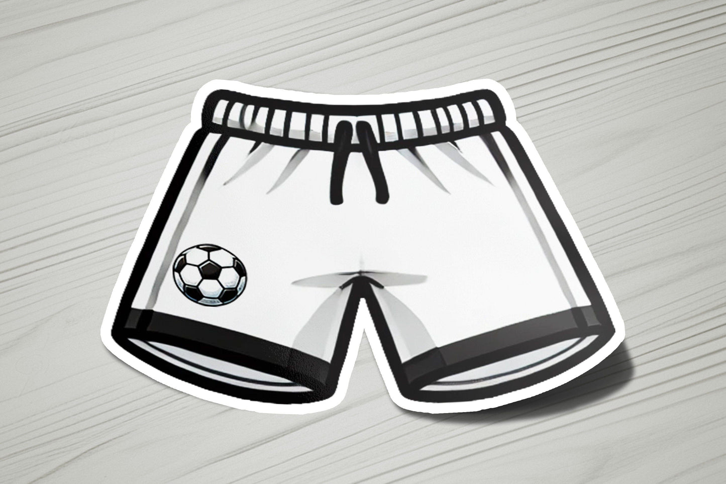 a paper cut out of a soccer shorts