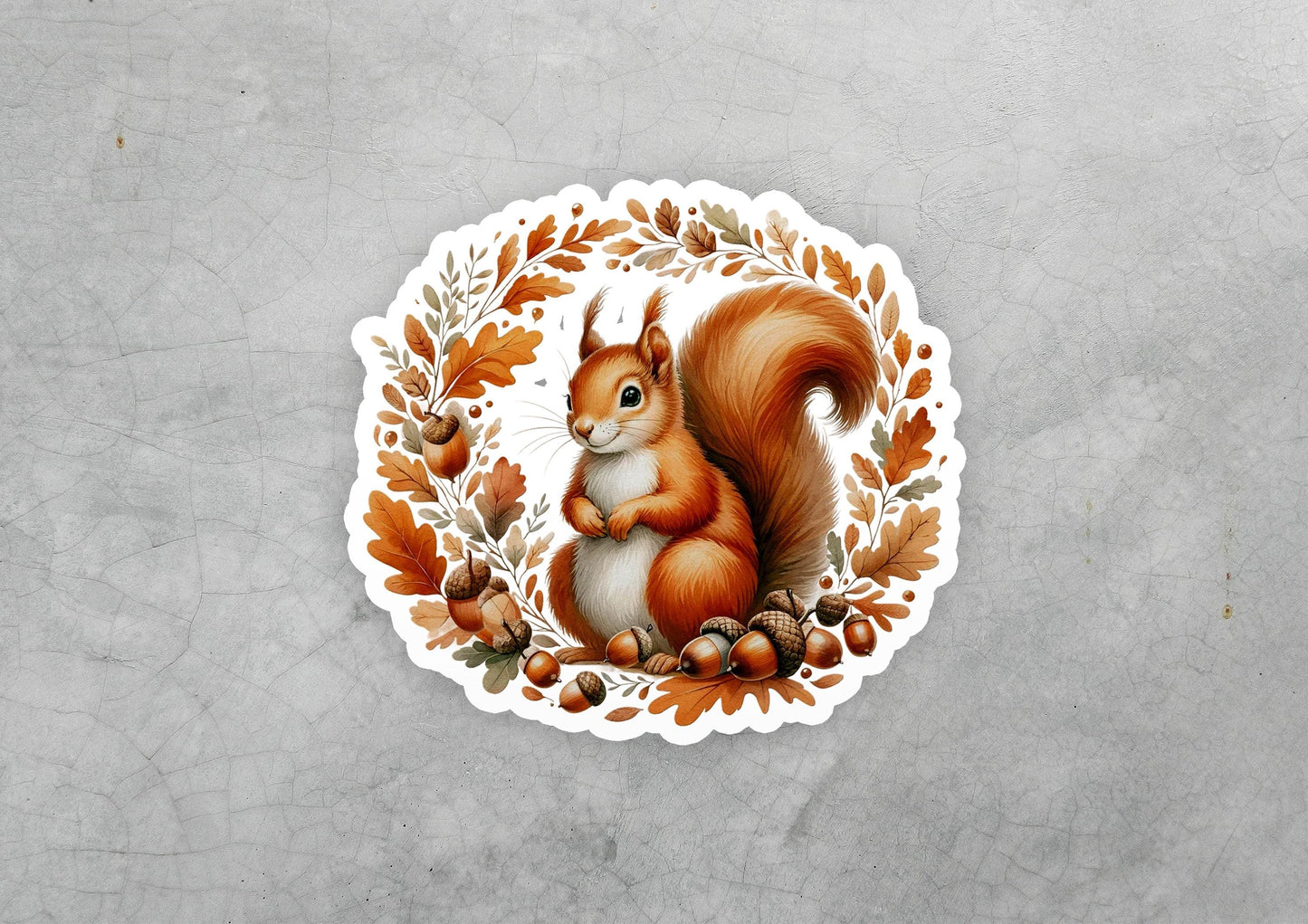 a sticker of a squirrel with acorns and leaves