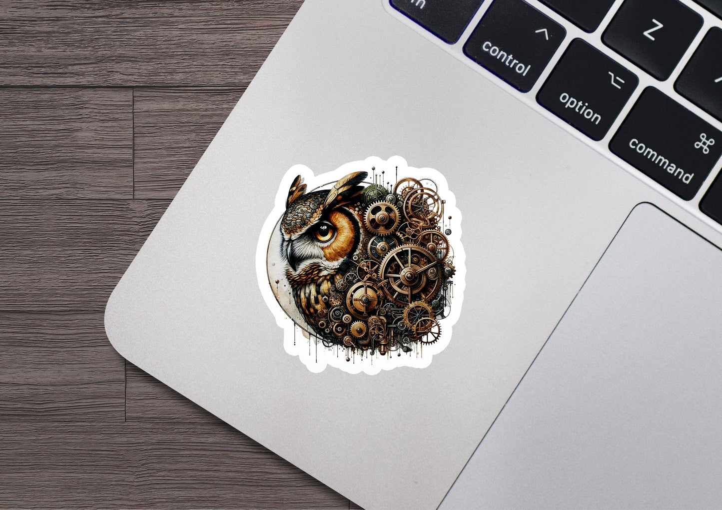 a sticker of an owl surrounded by gears
