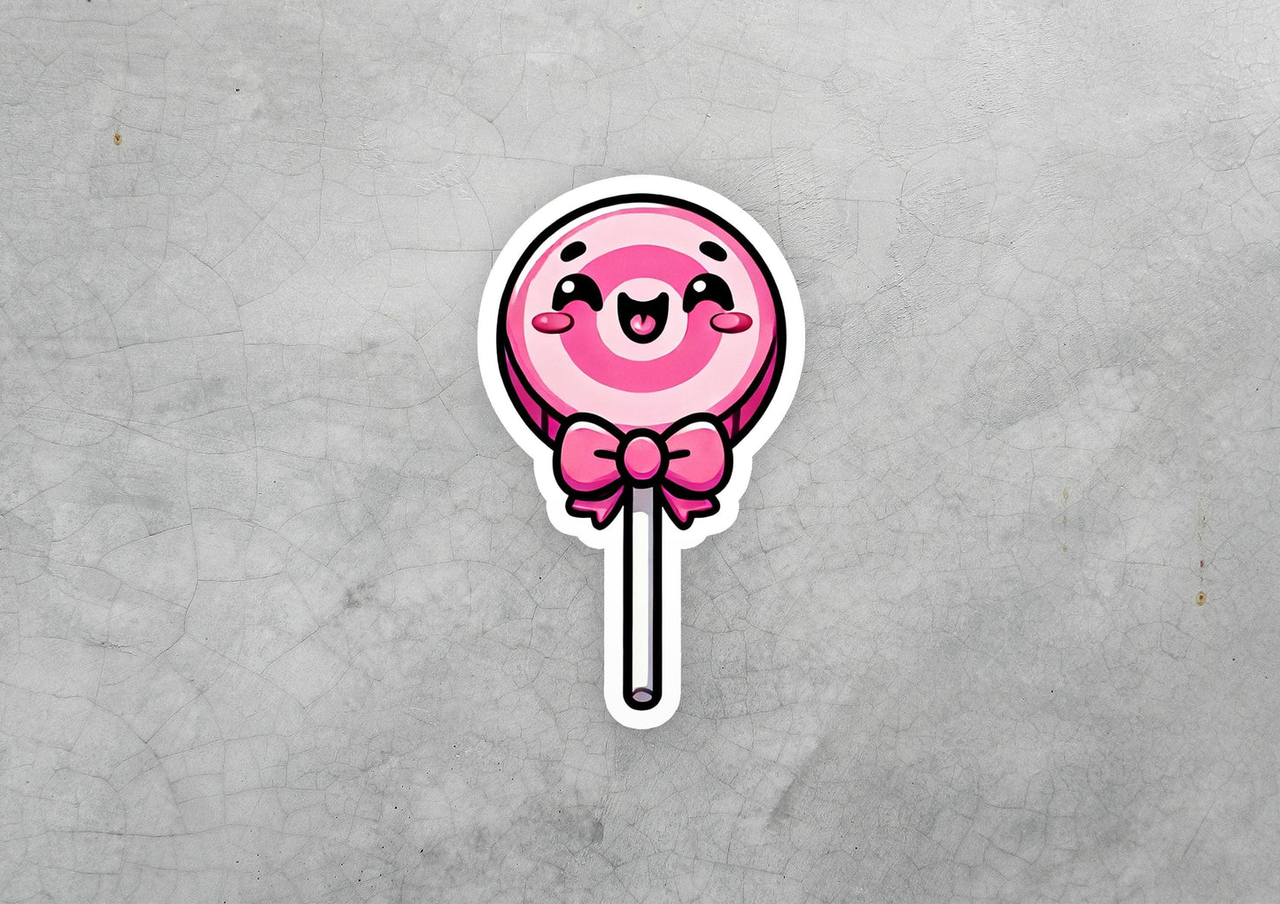 a sticker of a pink lollipop with a bow on it