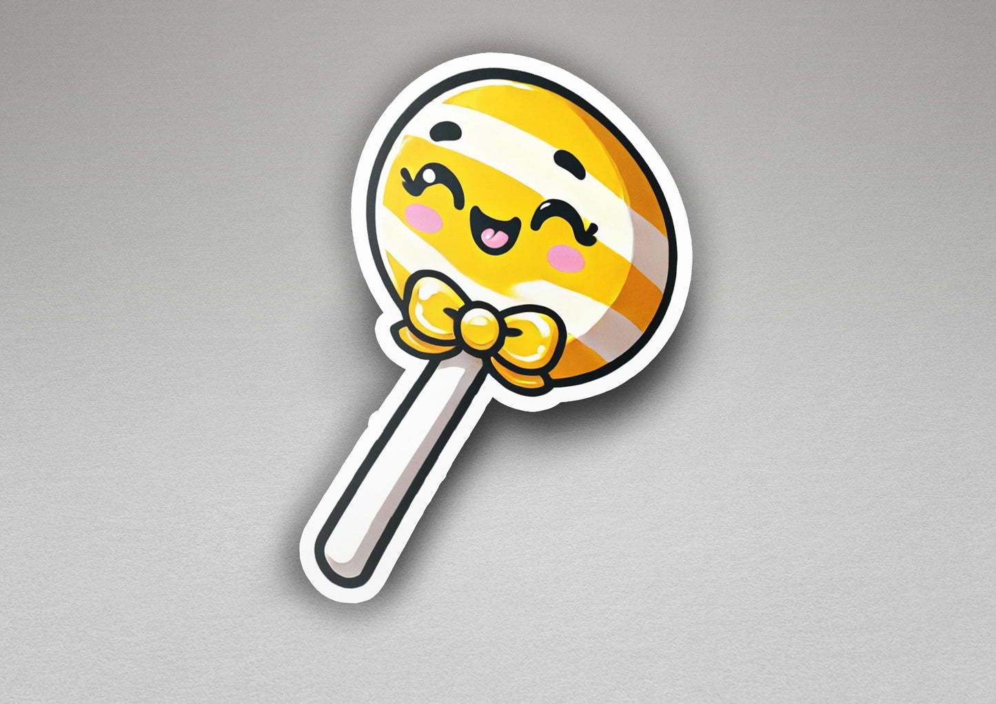 a sticker of a lollipop with a smiley face