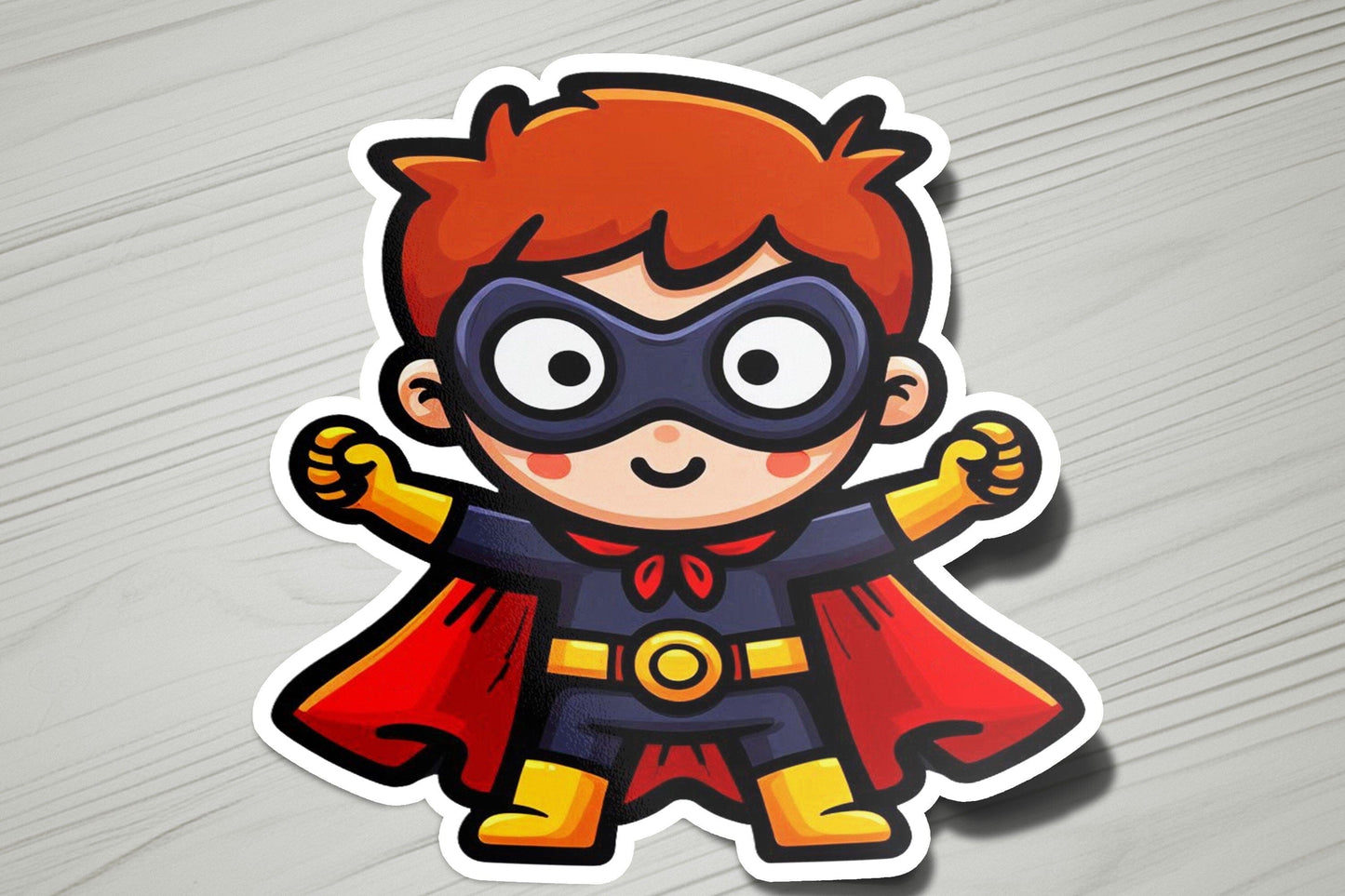 a sticker of a boy dressed as a superhero