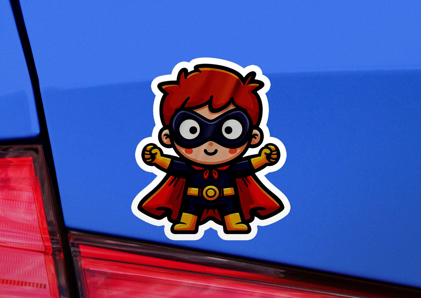 a sticker of a boy dressed as a super hero