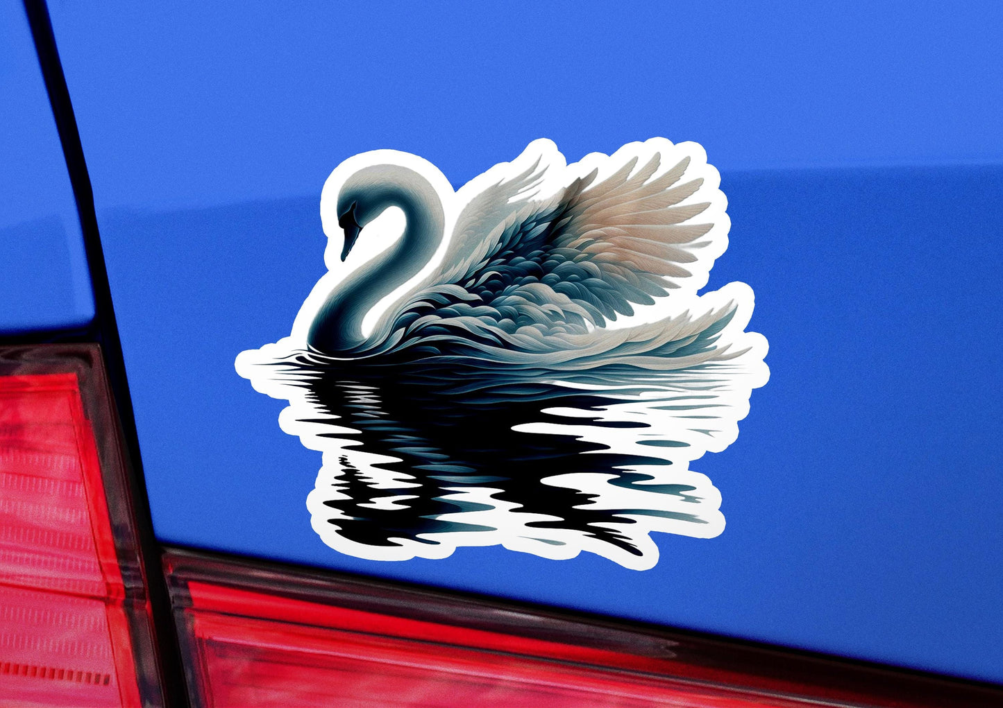 a sticker of a swan on the back of a car