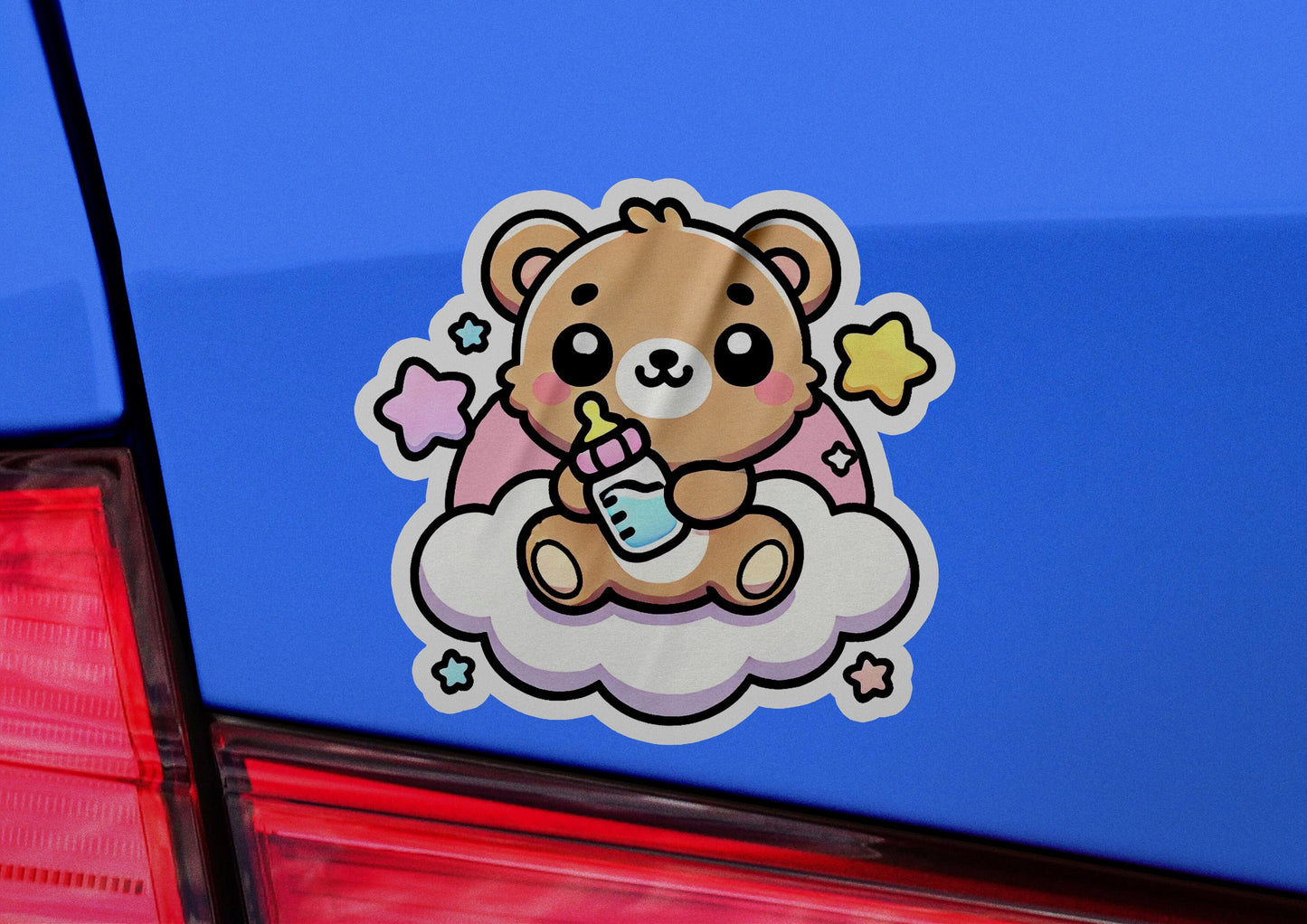 a sticker of a teddy bear sitting on a cloud