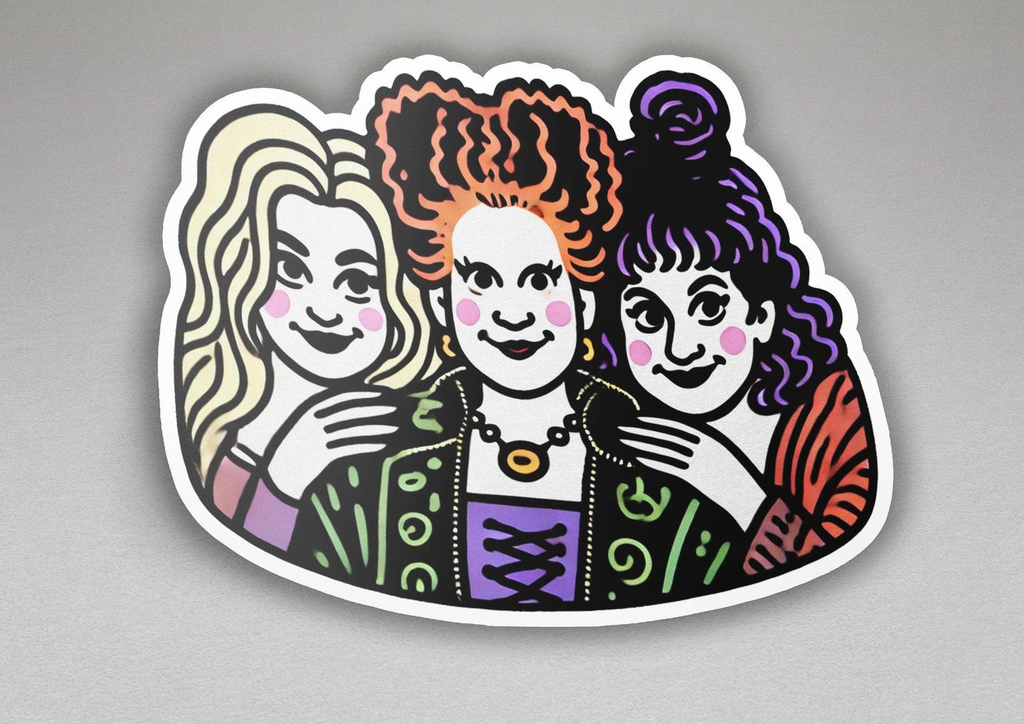 a sticker of three women with different hair colors