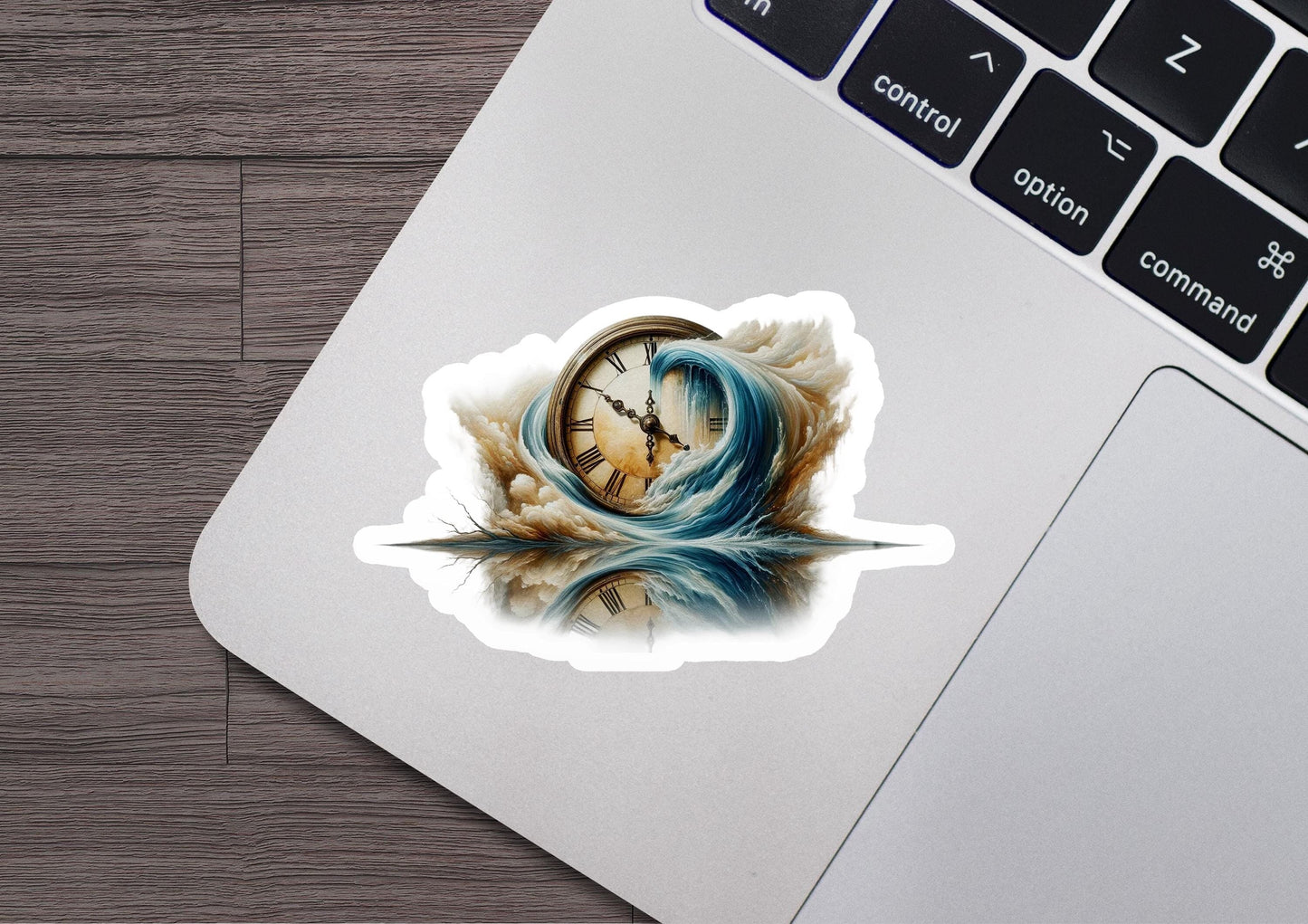 a clock sticker on a laptop keyboard