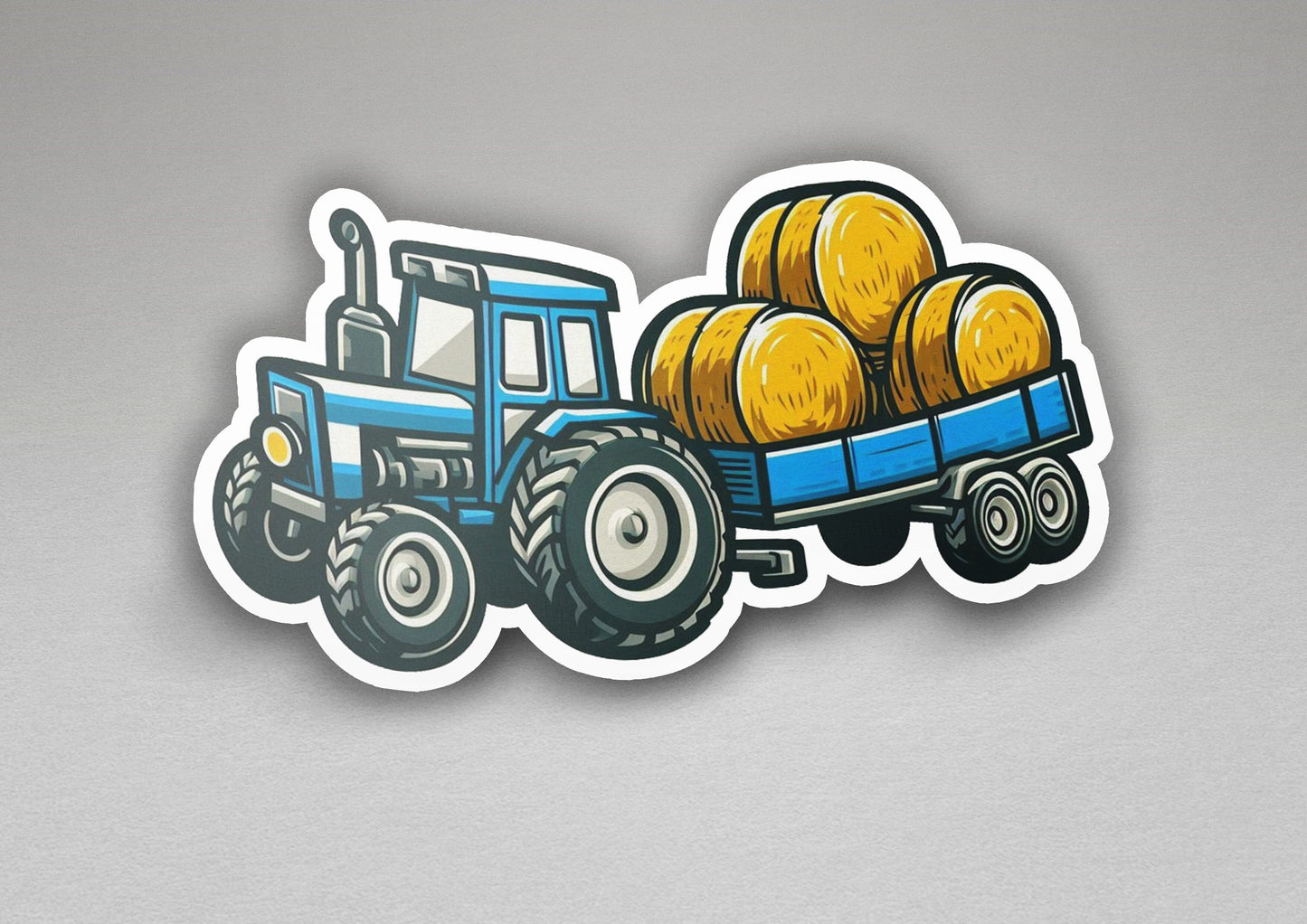 a sticker of a tractor with bales of hay