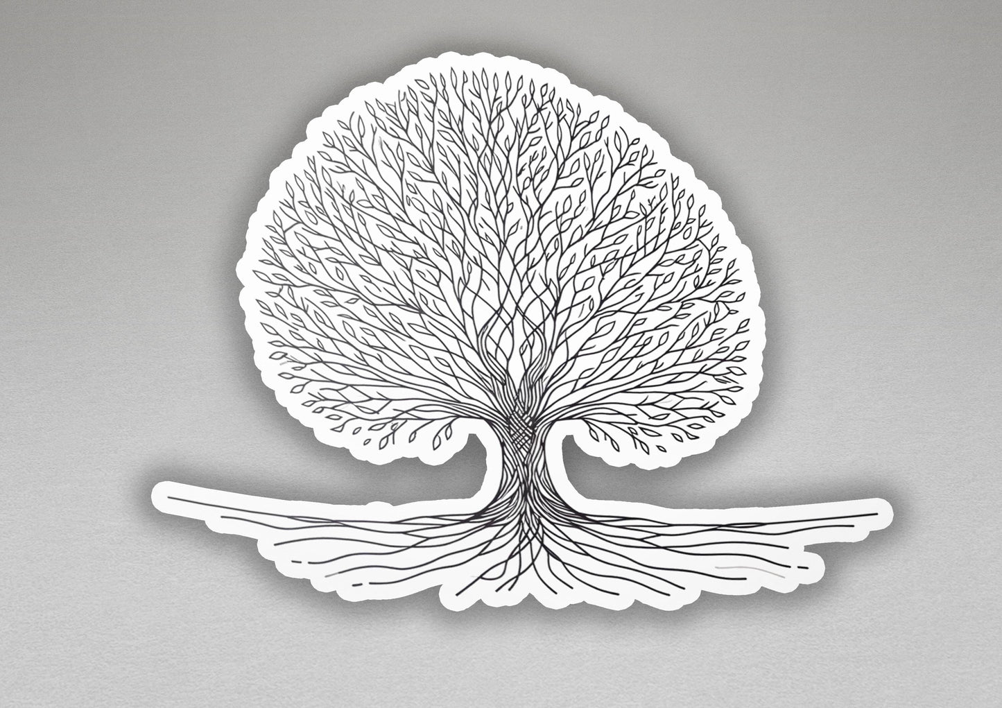 a paper cut out of a tree with roots
