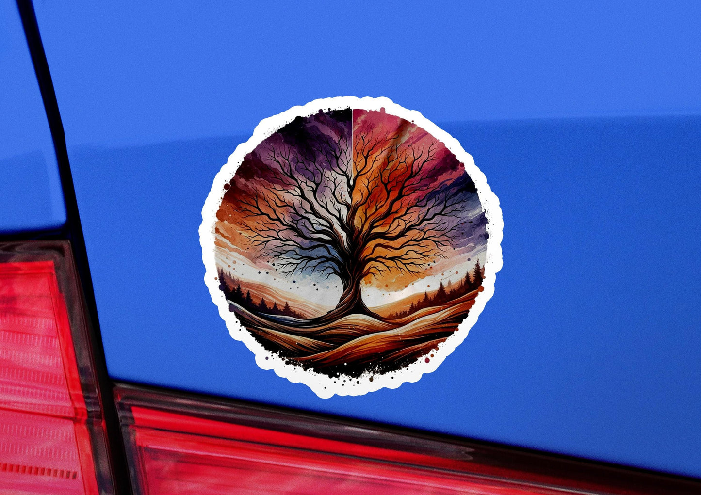 a sticker of a tree on the back of a car